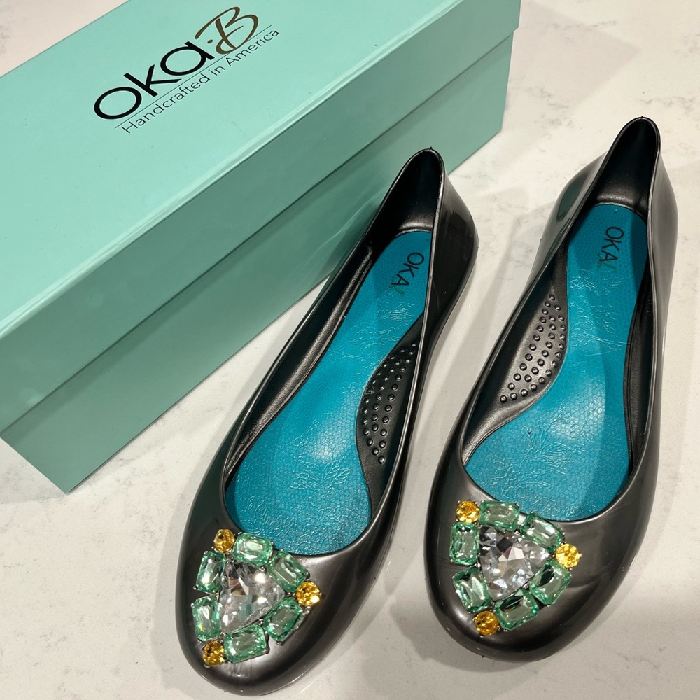NIB Oka.B  Pearlized grey rubber flats w/ornate rhinestone embellishment. Size 6